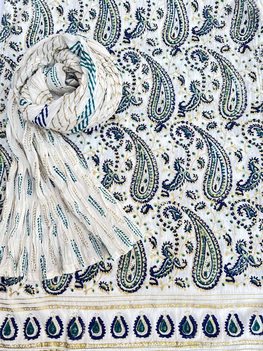 This gold and blue paisley design adds an elegant touch to our kora white fabric.